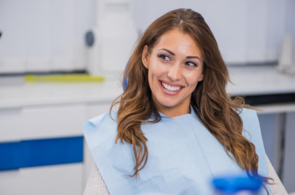 Cosmetic Dentist Manassas VA | Woman patient smiling.