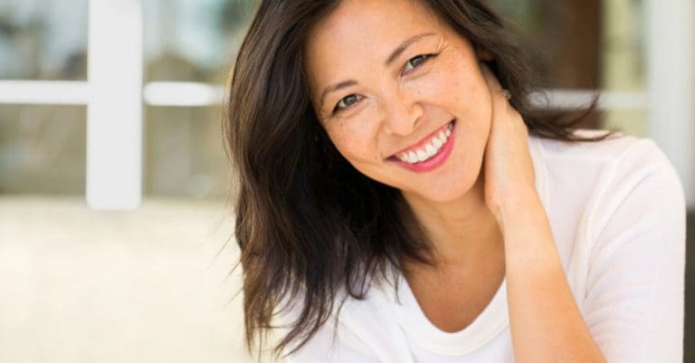 Dental Implant Manassas VA | Happy Asian woman.